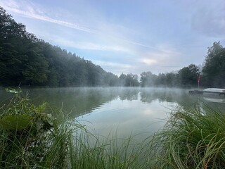 morning on the lake, some dust over the water 