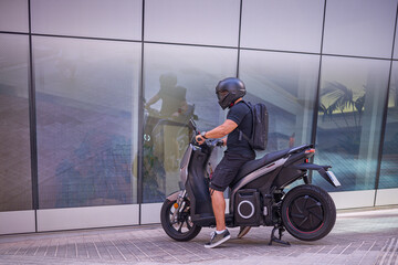 person on electric motorcycle