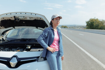 Brunette Woman Stranded by Broken Car on Speedway