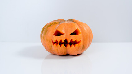 Jack-o'-lantern. One halloween holiday pumpkin with spooky facial expressions.