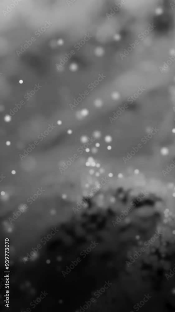 Poster background of moving monochrome abstract particles. monochromatic abstract background with bokeh obj