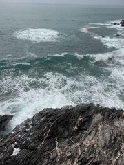 waves crashing on rocks
