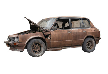 An abandoned rusted car isolated on white background with clipping path.