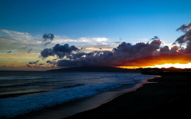 Fototapeta premium Beautiful sunset over beach in Ribiera Grande, Atlantic Ocean, Azores Islands.