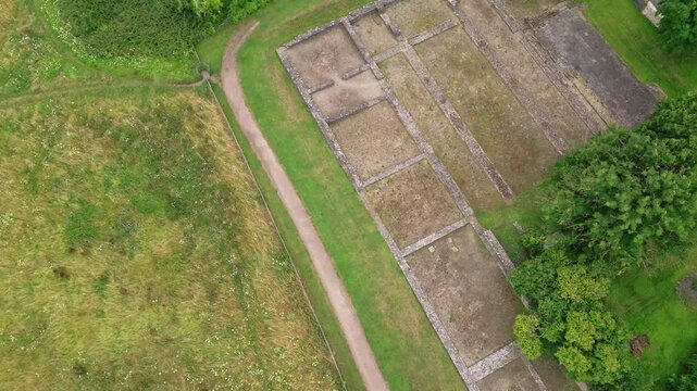 Orbit aerial view of the remains of an ancient Roman forum and market
