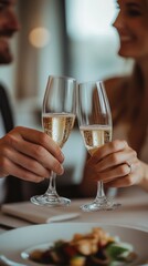 Obraz premium A couple clinks their champagne glasses together, enjoying a celebratory moment while dining at a cozy restaurant