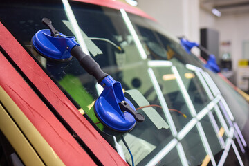 Installing windshield on a car with automotive design