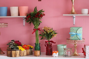 Pink wall with ornaments and flowers