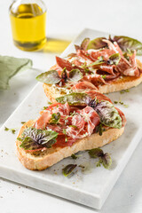 bruschetta with coppa and basil