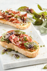 bruschetta with coppa and basil