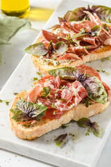 bruschetta with coppa and basil