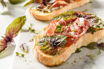 bruschetta with coppa and basil
