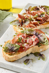 bruschetta with coppa and basil
