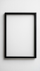 Close-up empty black frame on minimalist white background