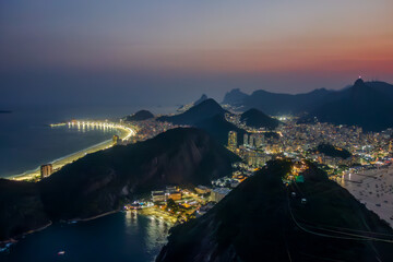 Top night view of Rio de Janeiro from Sugarloaf Mountain during sunset (Brazil).