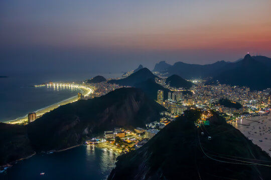 Top night view of Rio de Janeiro from Sugarloaf Mountain during sunset (Brazil). - Powered by Adobe