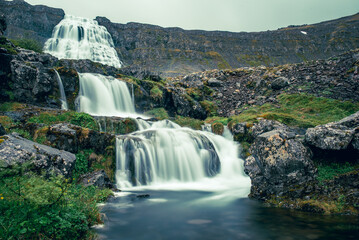 Naklejka premium Dynjandi is one the most famous waterfall of the West Fjords of Iceland at summer
