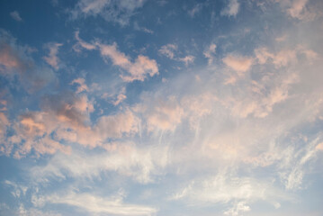 pink clouds painted by the setting sun