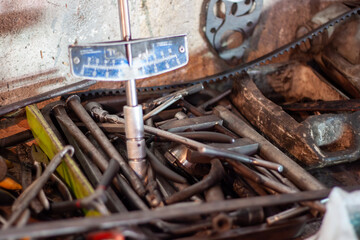 Vintage Mechanical Workshop with Visible Tools and Parts in Disarray