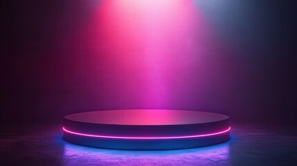 A large, round stage with a purple and pink light shining on it