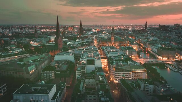 Drone shot of Night Hamburg Town hall ( Hamburger Rathaus ) and Town Hall Market Rathausmarkt , Hamburg Germany 