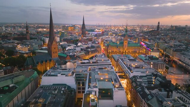 Hamburg city night aerial skyline top view drone footage of city hamburg germany in4K, hamburg town hall, city hal in main sqaure old town.