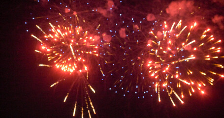 Blurred background Red Firework celebrate anniversary happy new year 2025, 4th of july holiday...