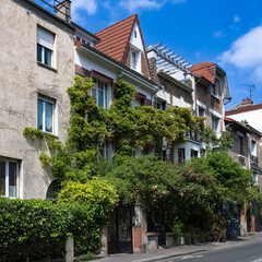 Paris, picturesque neighborhood of the Campagne in Paris, in the 20e arrondissement, in spring 
