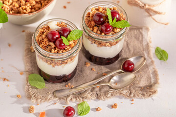 Healthy and homemade cherries granola made of sweet  ingredients.