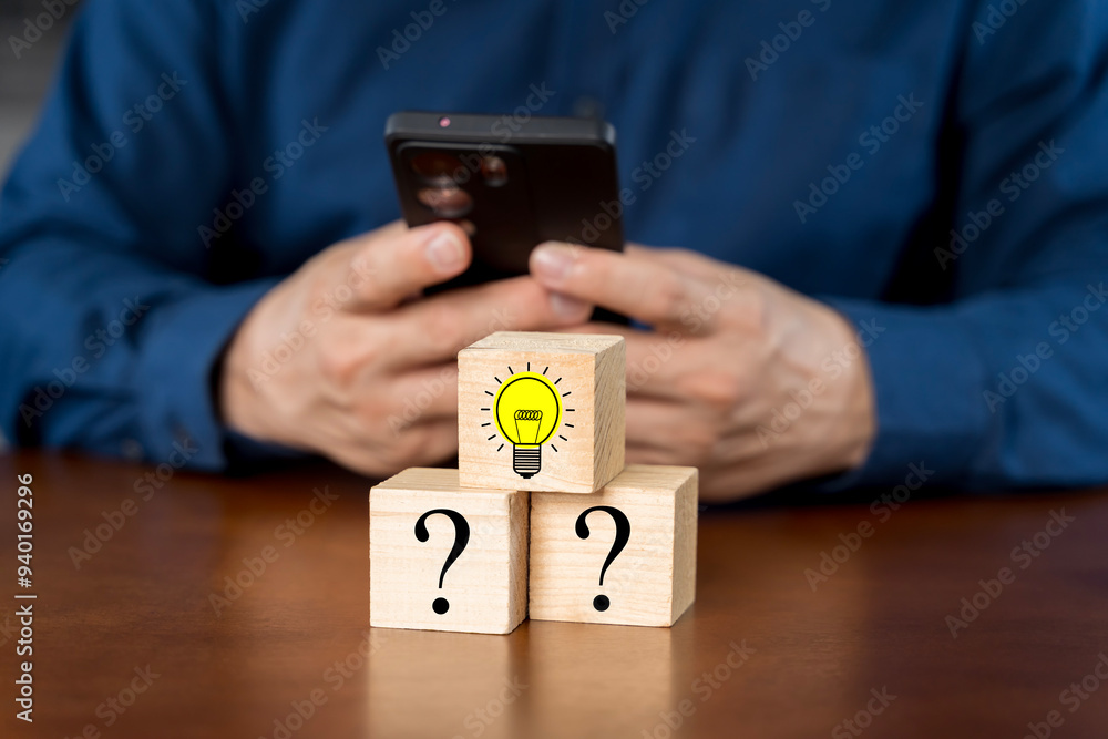 Poster man using smartphone at desk searching for new things