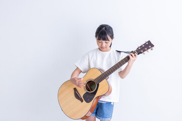 Obraz premium ギターを持った女の子 girl with a guitar