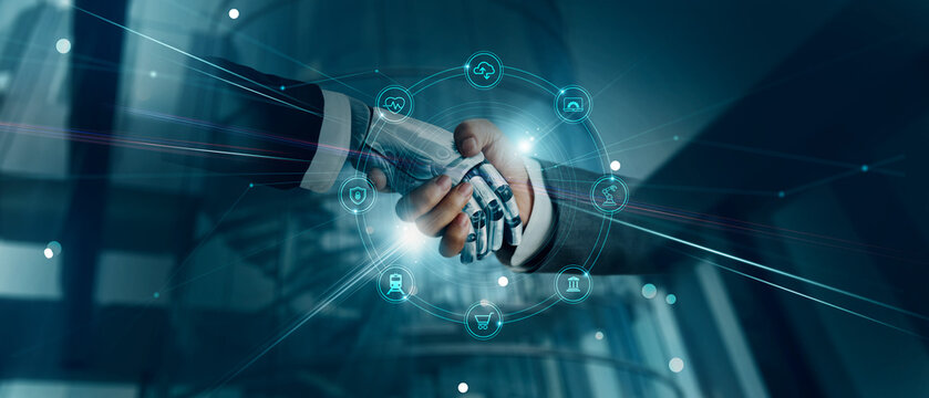 .Handshake of robot and human, AI, Machine learning, AI adoption for working to Assistant of business, Data digital Transformation, Science and artificial intelligence technology for futuristic.