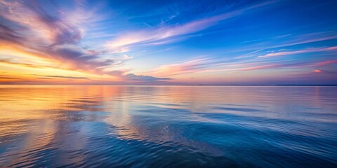Obraz premium Tranquil ocean at twilight with calm waters reflecting the soft colors of the sky , serene, peaceful, ocean, twilight, calm