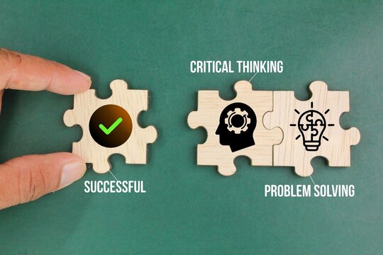 wooden puzzle with icons and the words Critical thinking and problem solving. skills to be successful.