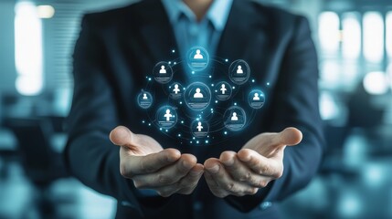 A human resources manager is developing a training program for employees. The image symbolizes teamwork, growth, development, collaboration, and leadership in the workplace.