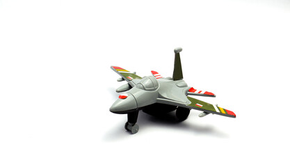 A Children's Toy In The Shape Of An Airplane, With Isolated White Background, Rule Of Thirds Photo Composition