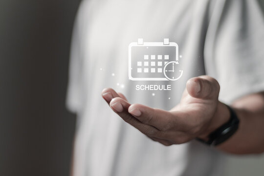 Person holding schedule icon on virtual screen for agenda meeting plan schedule in personal organizer and agenda meeting appointment activity information.