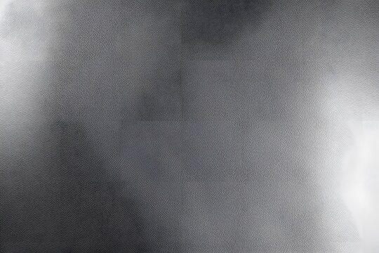 A metallic silver leather texture with a smooth reflective surface, AI Generated