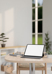 A digital tablet with a white-screen mockup and a wireless keyboard on a wooden table in a minimalist bright room. place of work concept, 3d render, 3d illustration
