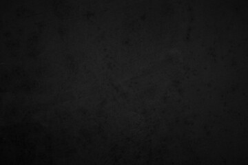 Black dark concrete wall background. Pattern board cement texture grunge dirty scratched for show anthracite promote product urban floor and abstract paper design element decor. Blackboard blank.