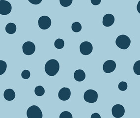 All over seamless repeat pattern with tossed dark navy dot on soft warm blue ground. Versatile trendy modern background with tossed dots