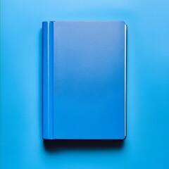 Blue Binder Lying Flat on a Plain Surface in a Clean Minimalist Office Setting   Organized Workspace Accessory for Business and Productivity