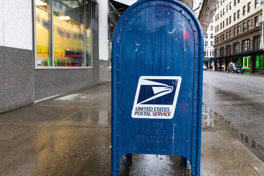 Portland, Oregon, USA- March 14, 2022: USPS box in the streets in Downtown Portland, Oregon