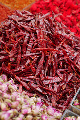 Fototapeta premium Exploring the Vibrant Red Dried Chili Peppers Displayed Beautifully in a Local Market