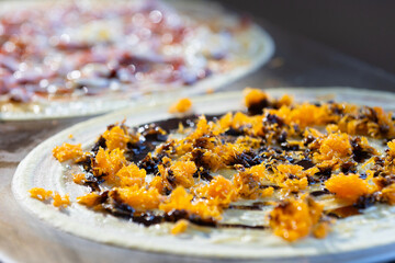 Japanese crepes are light, crispy desserts made by frying a thin layer of crepe batter until golden brown. Once cooked, the crepe is folded or rolled into a cone shape and filled with either sweet 