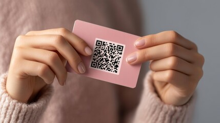 Woman Holding Pink QR Code Card
