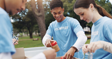Donation, volunteering and group of people in park together for sustainability, teamwork and ngo...
