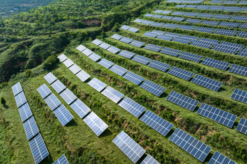 view of solar power station on green hill