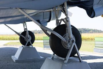 Old aeroplane carriage for wheels. Detail of a wheel carriage components of a vintage aeroplane,...
