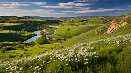 Obraz premium Serene River Valley Landscape with Green Hills and White Flowers